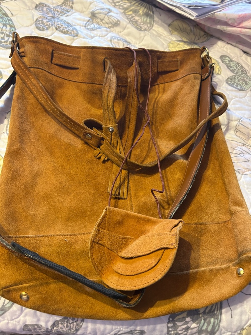 Suede Tassel Bucket Bag in Cognac
